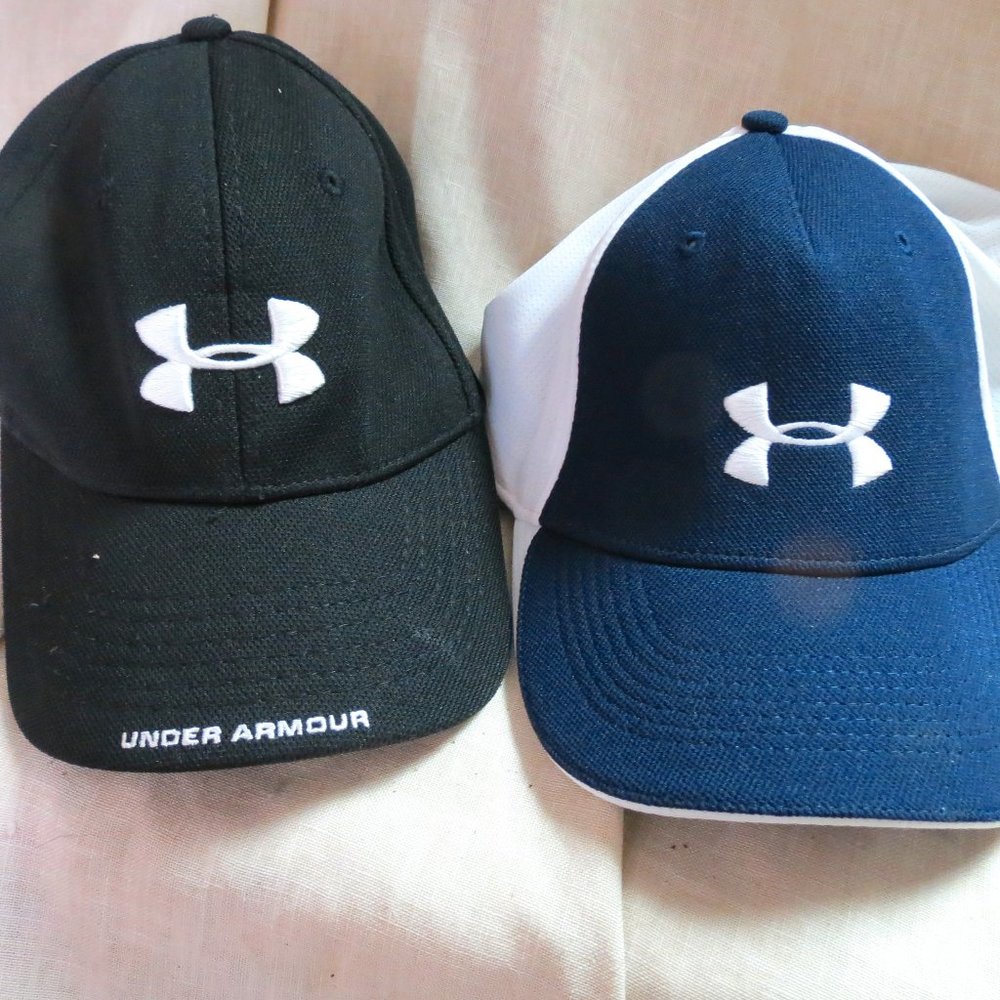 Pair of Under Armour ball caps Hats, black, blue and white